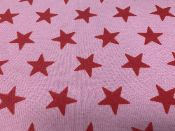 Reststück 20 cm Interlock Sterne rot - rosa
